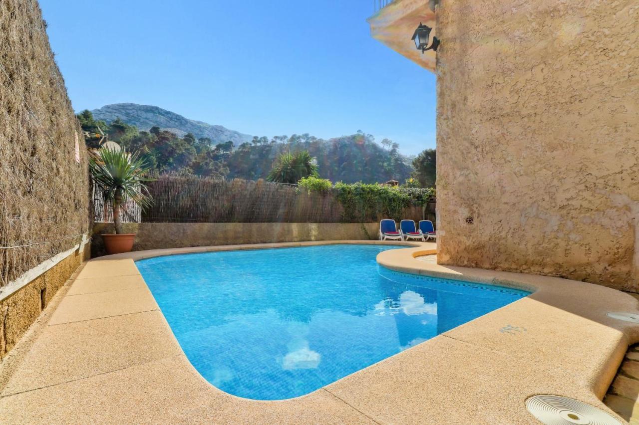 March By Villa Cala de Sant Vicenc